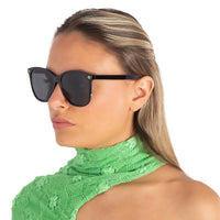 Gucci GG0024S-001 Chic Black Cat-Eye Shades with Gold Rivet Detail