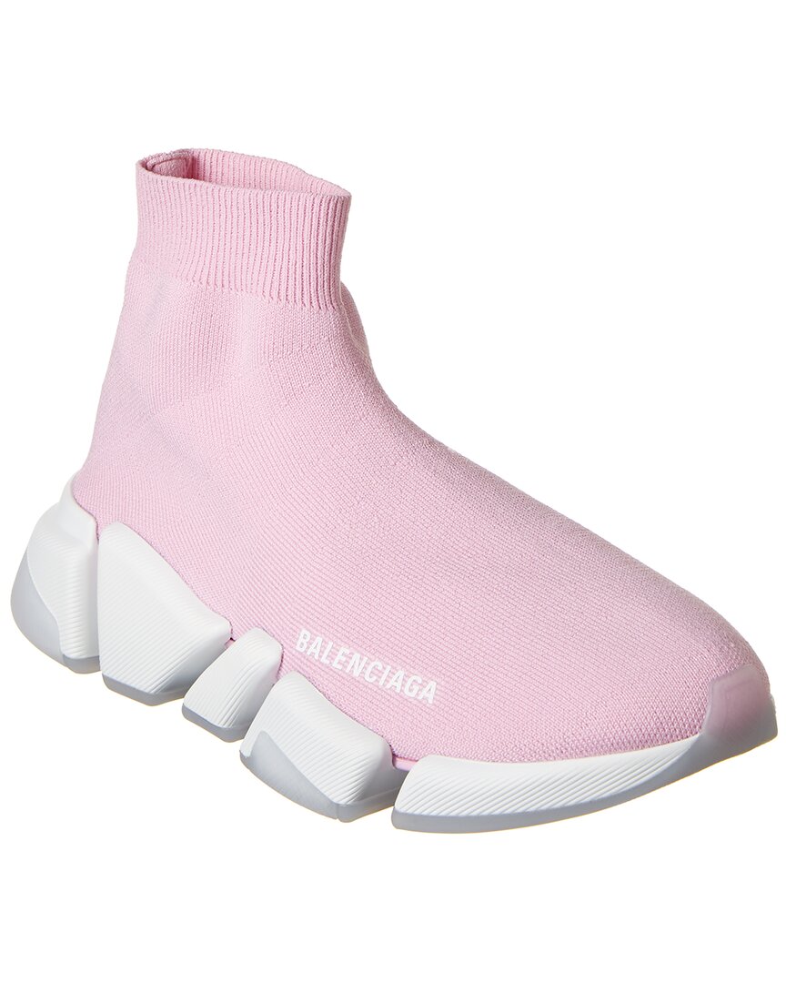 Vibrant pink Balenciaga Speed 2.0 sock sneaker with a sleek knit design, modern shape, and chunky rubber sole for traction.