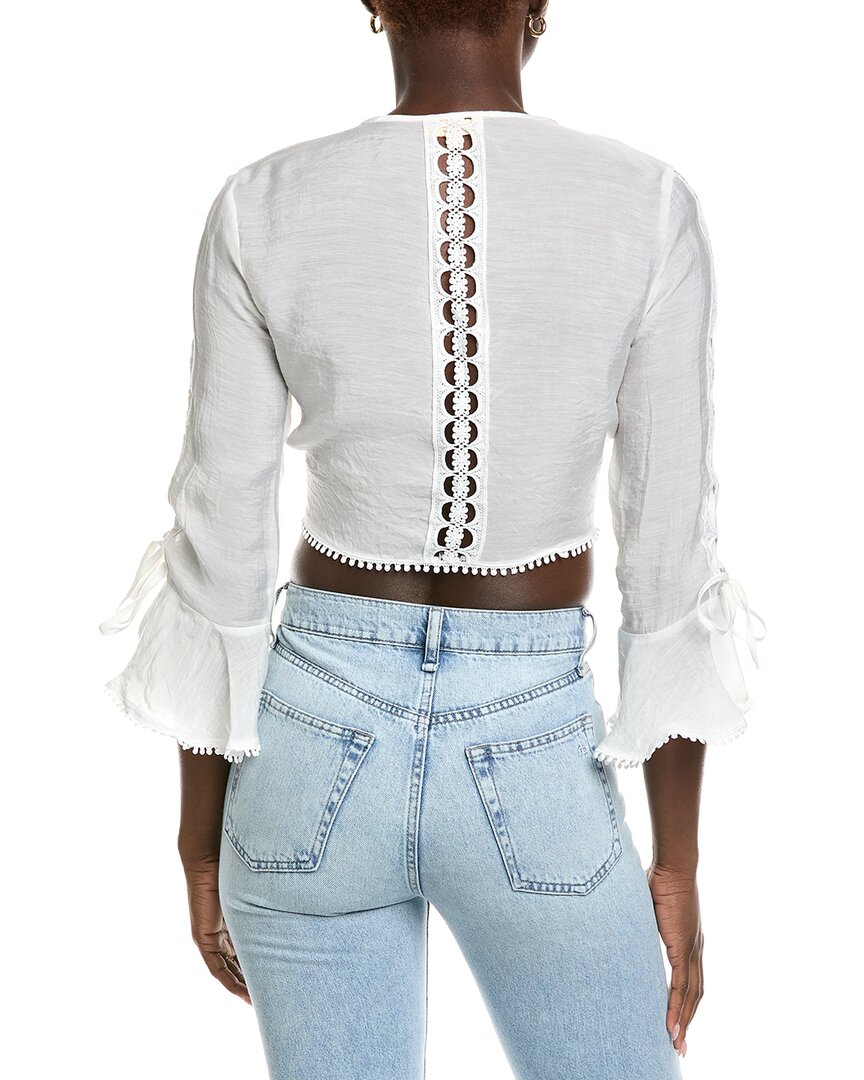 Norma Kamali Embroidered Flare Top