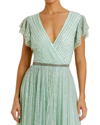 Mac Duggal Sequined Wrap Over Ruffled Cap Sleeve Gown