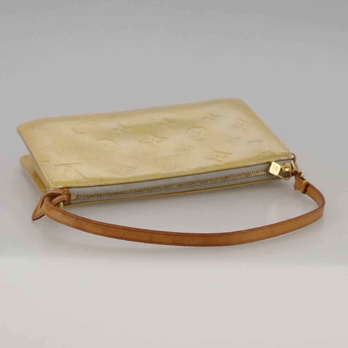 Louis Vuitton Lexington Yellow Patent Leather Clutch Bag (Pre-Owned)