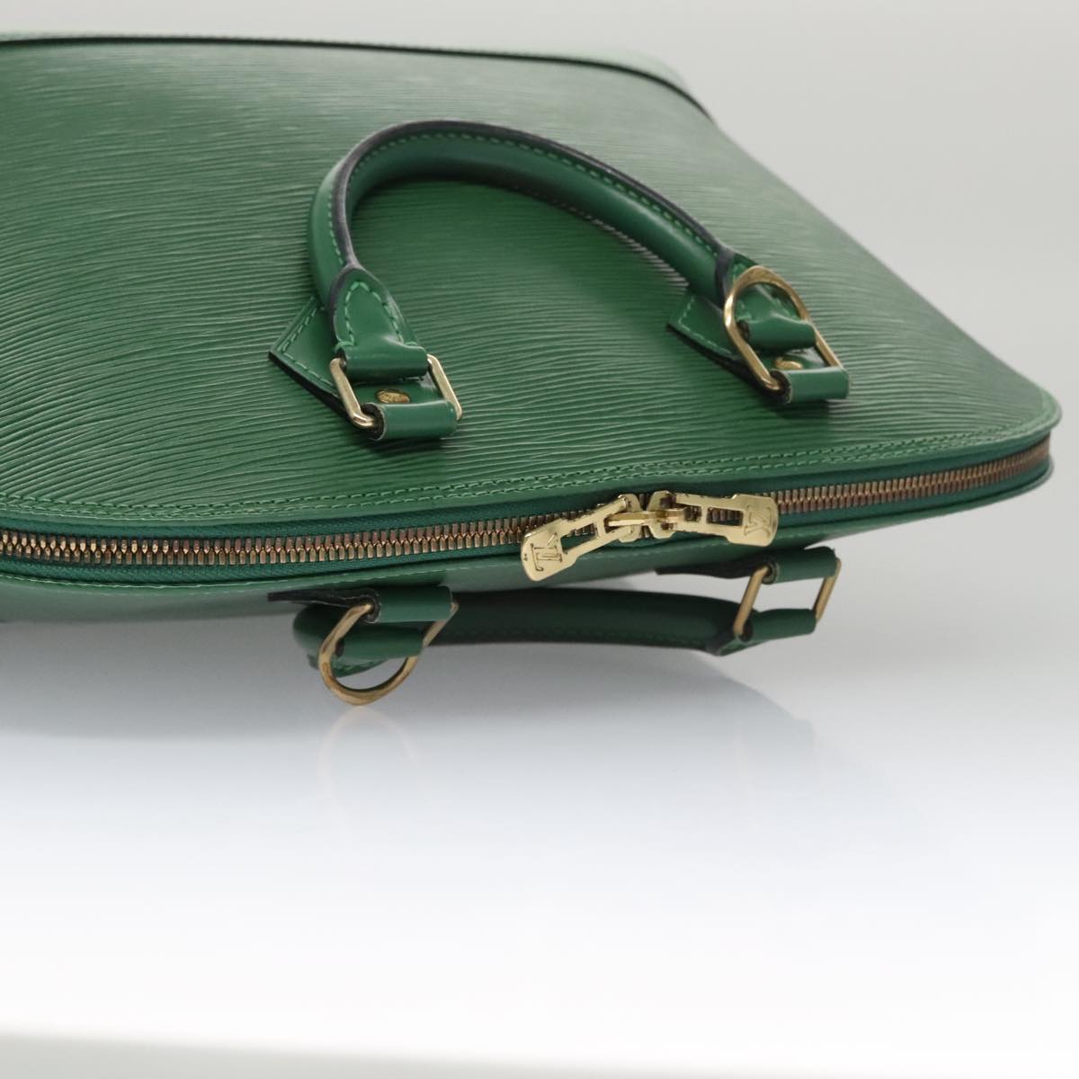 Louis Vuitton Alma Green Leather Handbag (Pre-Owned)