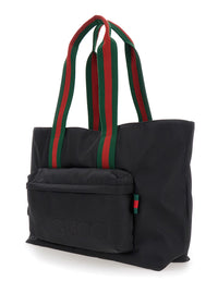 Gucci Men Black Tote Bag With Web Handles And Logo Lettering On The Front In Tech Fabric Man