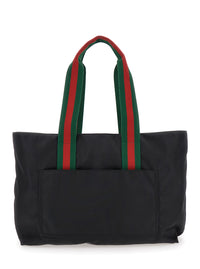 Gucci Men Black Tote Bag With Web Handles And Logo Lettering On The Front In Tech Fabric Man