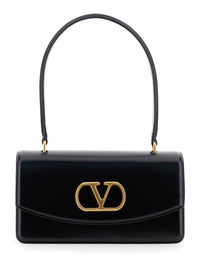 VALENTINO GARAVANI Valentino Garavani Women 'Vain' Black Shoulder Strap With Vlogo Plaque On The Front And One Top Handle In Leather Woman