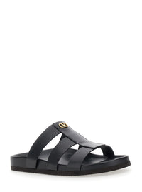 Valentino Garavani Men Sandals With Cage Design And Vlogo Plaque On The Front In Black Leather Man