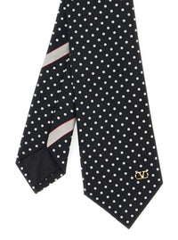 Valentino Garavani Men Black Tie With Vlogo Plaque On The Front And All-Over Polka Dot Pattern In Silk For Men