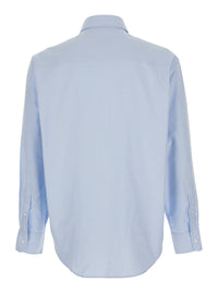 AMI PARIS Ami Paris Men Light Blue Shirt With Button Down Collar And Adc Embroidery In Light Blue Cotton For Men