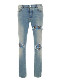 Amiri Men Light Blue Jeans With Ripped Details And Faded Design In Denim For Men