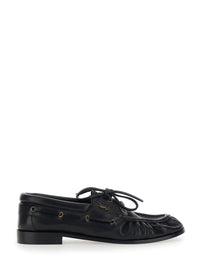 SAINT LAURENT Saint Laurent Men 'Le Loafer Bateau' Black Boat Shoes With Hand-Stitched Moc Toe And Cassandre Plate In Grained Leather Men