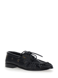 SAINT LAURENT Saint Laurent Men 'Le Loafer Bateau' Black Boat Shoes With Hand-Stitched Moc Toe And Cassandre Plate In Grained Leather Men