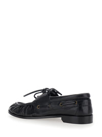 SAINT LAURENT Saint Laurent Men 'Le Loafer Bateau' Black Boat Shoes With Hand-Stitched Moc Toe And Cassandre Plate In Grained Leather Men