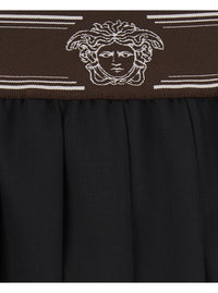 Versace Women Black Pleated Skirt With Medusa Decoration At The Waist In Wool For Women