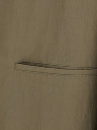 Gucci Women Beige Long Trench Coat With Classic Collar And Two Welt Pockets On The Front In Tech Fabric For Women