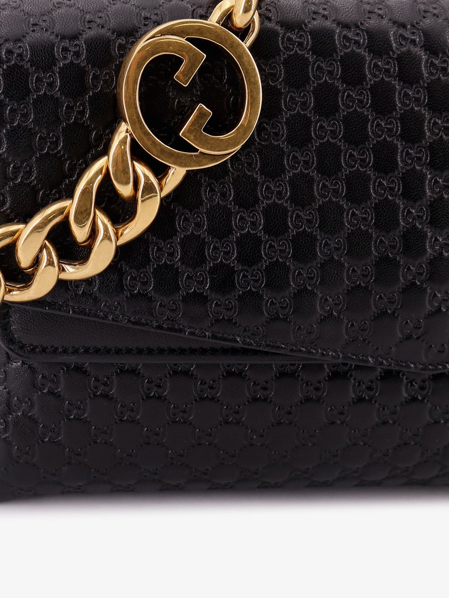 Gucci Women Leather Crossbody Bag With Embossed Gg Motif