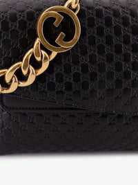 Gucci Women Leather Crossbody Bag With Embossed Gg Motif