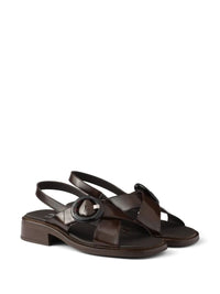 PRADA Brushed Leather Crisscross Band Sandals With Plexiglas Buckle Women