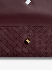 BOTTEGA VENETA Bottega Veneta Women Andiamo Suede Clutch With Intrecciato Pattern