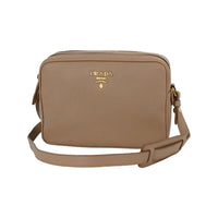 67bf25022007ac507d85c2de_prada-women-s-beige-vitello-phenix-leather-crossbody-1bh079_1789418656511.jpg