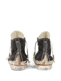MAISON MARGIELA Maison Margiela Men High-Top Sneakers With A Distressed Effect