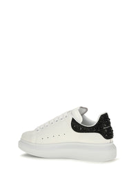 Alexander Mcqueen Women Oversized Sneakers With Suede Heel And Crystal Details