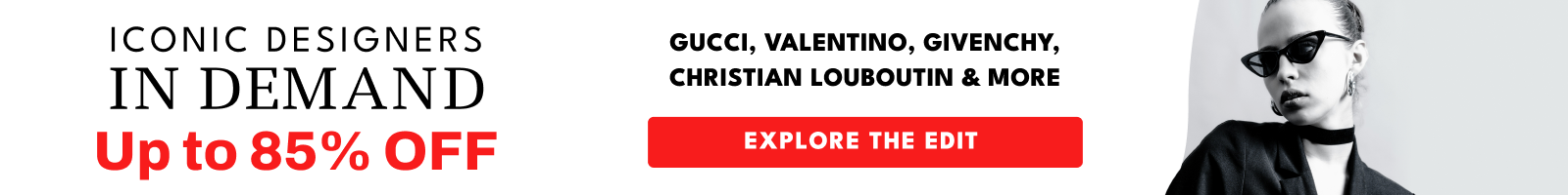 Promotional banner for designer clothing with a man wearing sunglasses and a black outfit.