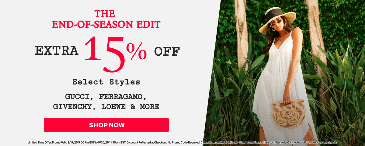 A promotional banner featuring a woman in a white dress and hat walking in a lush green forest on the right, alongside text on the left that reads 'THE-END-OF-EDITION EXTRA 15% OFF Select Styles' and a red 'SHOP NOW' button.