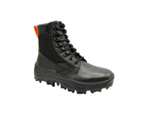 Stylish MCM men's black leather combat boots with reflective patches and vibrant orange pull tabs, crafted in Italy.