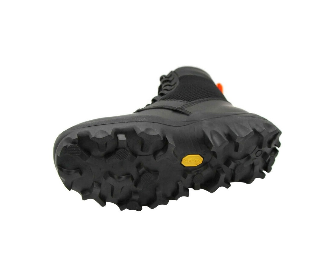 Stylish MCM men's black leather combat boots with reflective patches and vibrant orange pull tabs for a bold look.