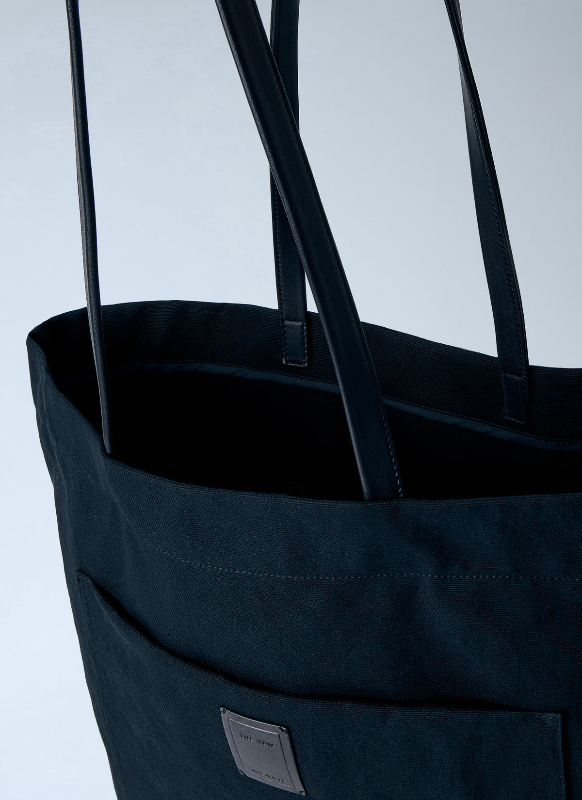 The Row Men Tori Leather-Trimmed Canvas Tote Bag
