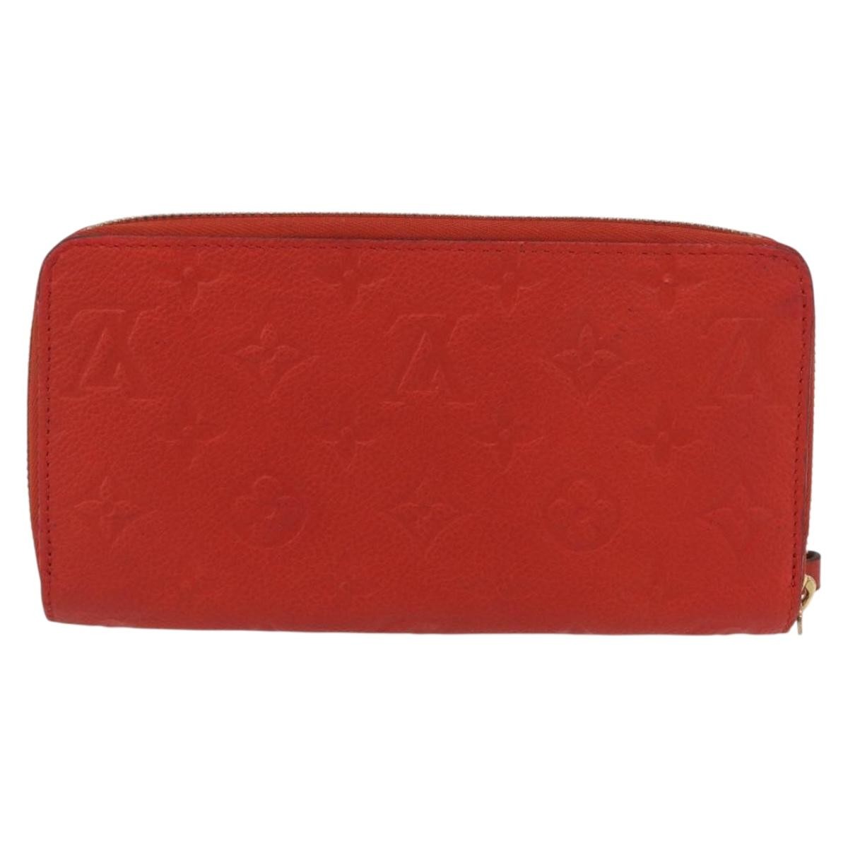 Louis Vuitton Portefeuille Zippy Monogramme Empreinte Monogramme Empreinte Orange Leather Wallets Accessory (Authentic Pre-Loved)