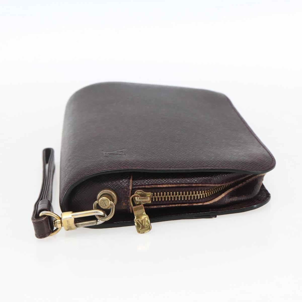 Louis Vuitton Pochette Baikal Clutch Taiga Leather Burgundy Leather Clutche & Pouche Bag (Authentic Pre-Loved)