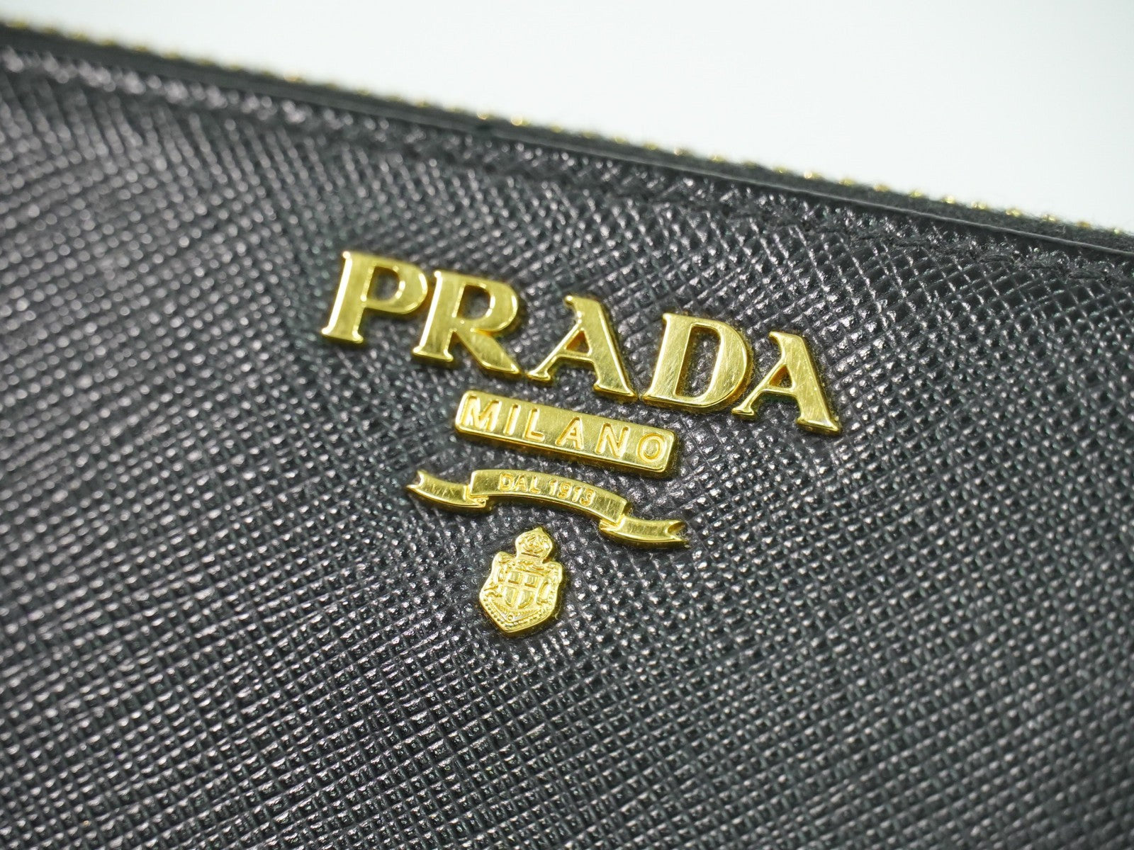 Prada Zip Around Tab Wallet Saffiano Leather Black Leather Wallets Accessory (Authentic Pre-Loved)
