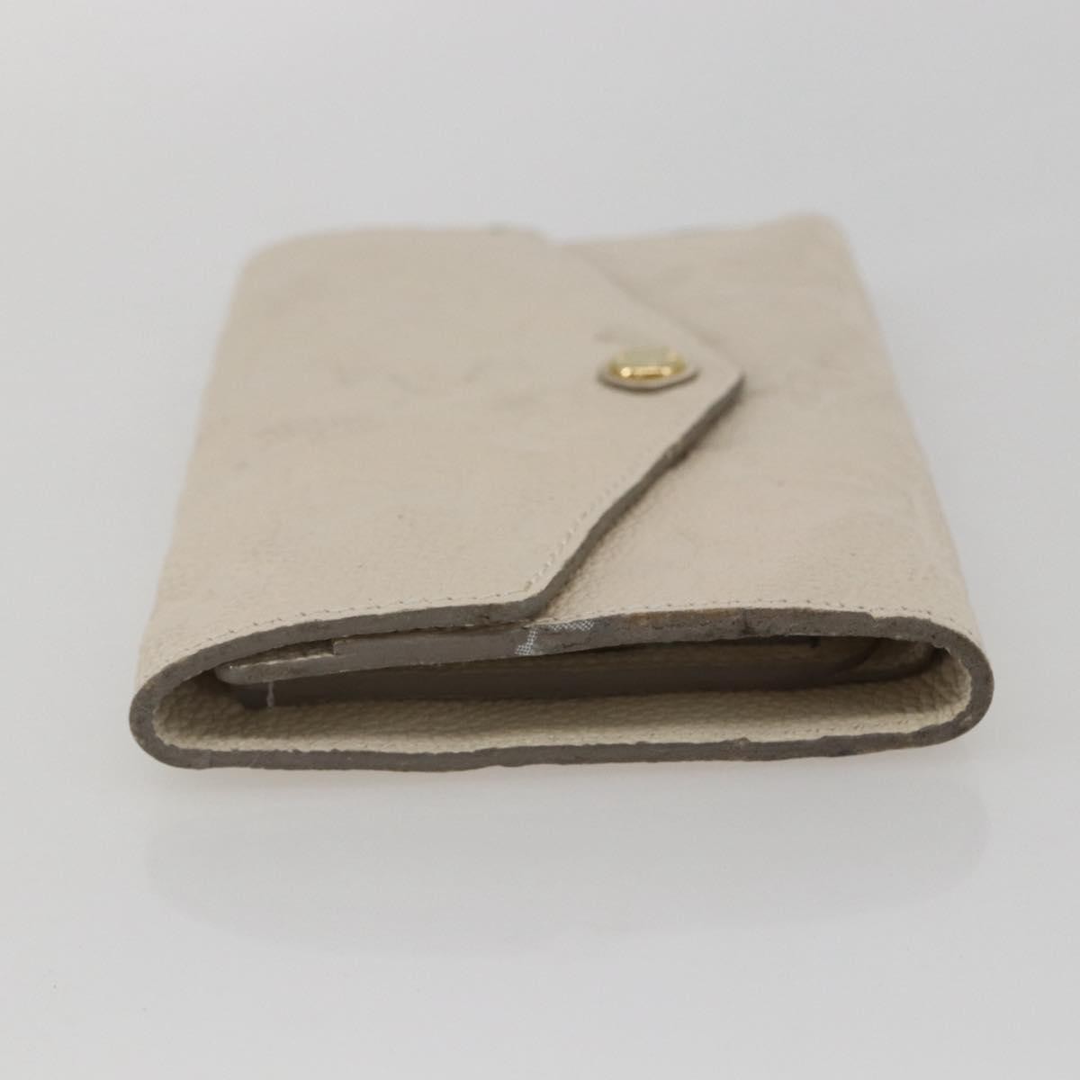 Louis Vuitton Zoe Wallet Monogram Empreinte Leather Beige Leather Wallets Accessory (Pre-Loved)