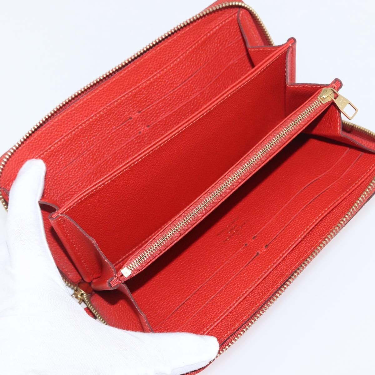 Louis Vuitton Portefeuille Zippy Monogramme Empreinte Monogramme Empreinte Orange Leather Wallets Accessory (Authentic Pre-Loved)