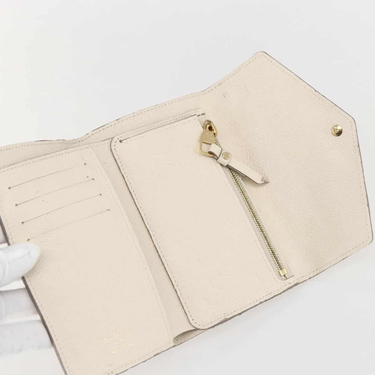 Louis Vuitton Zoe Wallet Monogram Empreinte Leather Beige Leather Wallets Accessory (Pre-Loved)