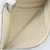 Chanel O Case Clutch Quilted Perforated Lambskin Silver Leather Clutche & Pouche Bag (Pre-Loved)