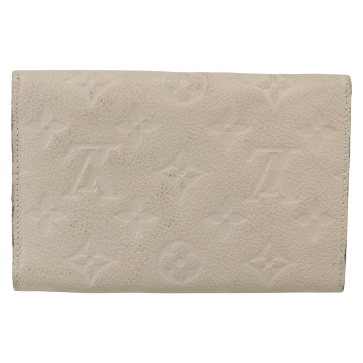 Louis Vuitton Zoe Wallet Monogram Empreinte Leather Beige Leather Wallets Accessory (Pre-Loved)