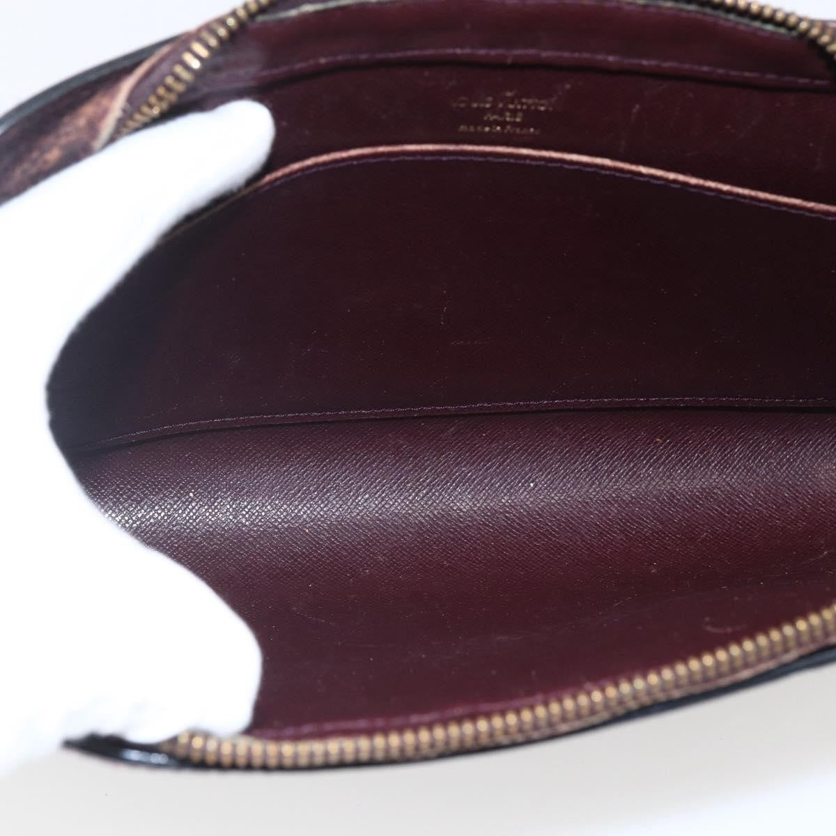Louis Vuitton Pochette Baikal Clutch Taiga Leather Burgundy Leather Clutche & Pouche Bag (Authentic Pre-Loved)