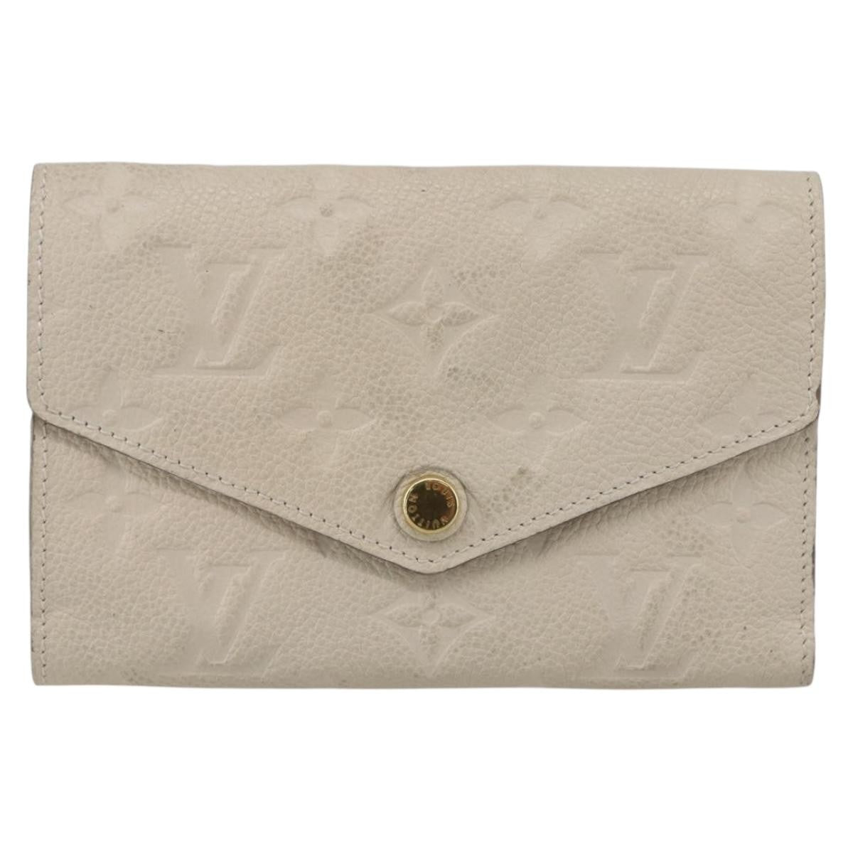 Louis Vuitton Zoe Wallet Monogram Empreinte Leather Beige Leather Wallets Accessory (Pre-Loved)