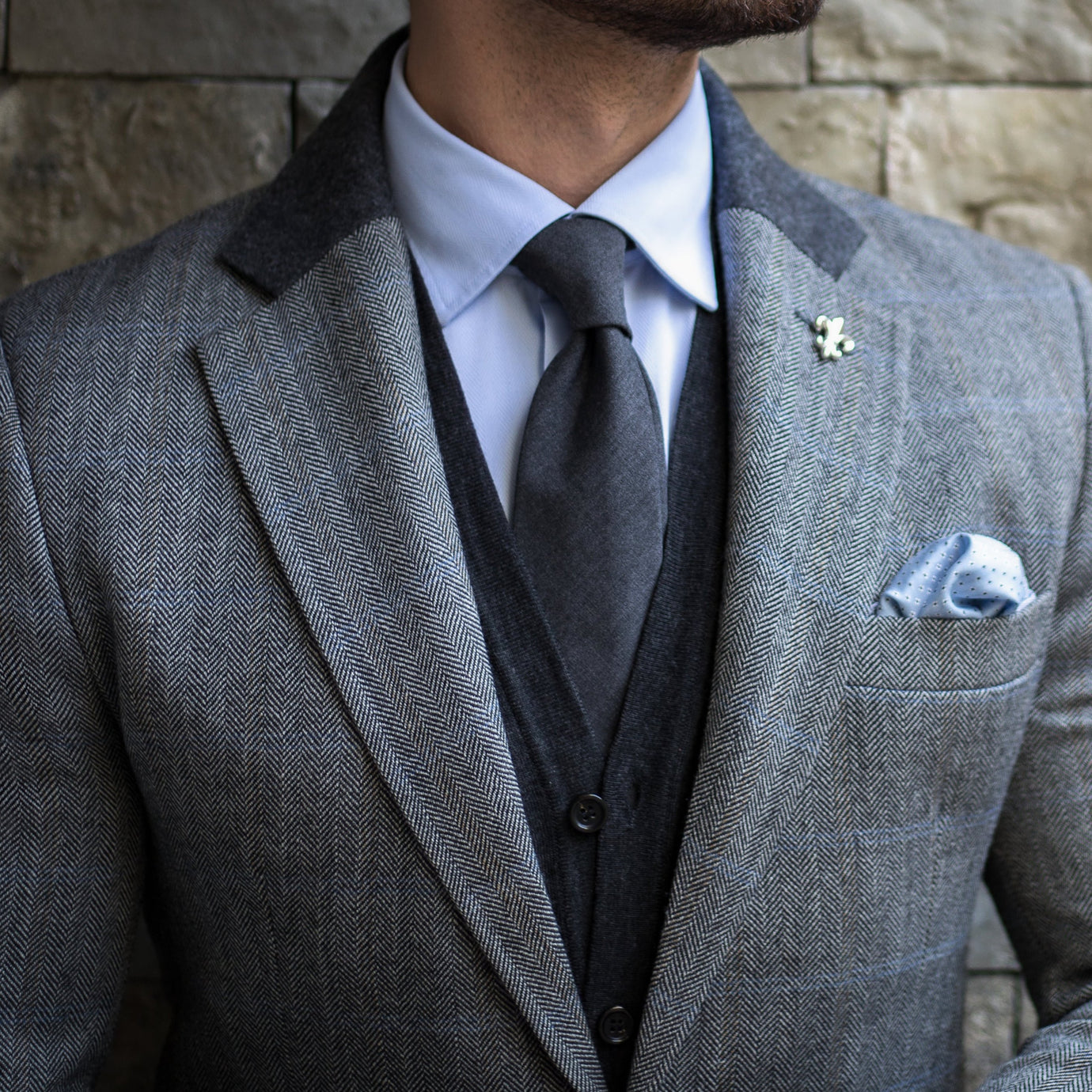 Man wearing a grey jacket