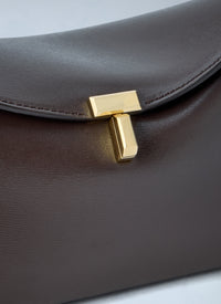 Toteme Women T-Lock Leather Clutch