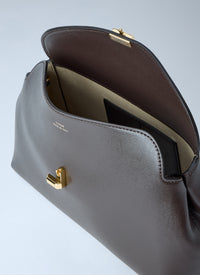 Toteme Women T-Lock Leather Clutch