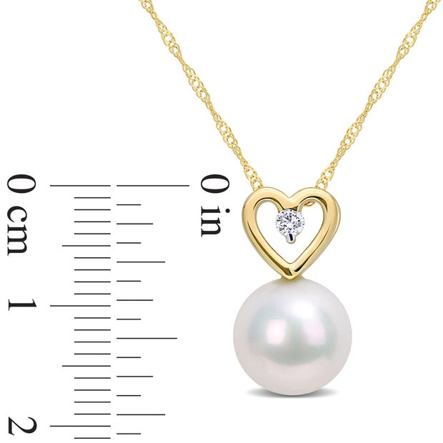 0.05 CT Diamond TW 9.5 - 10 MM White Freshwater Cultured Pearl Fashion Pendant With Chain 10k Yellow Gold GH I2;I3